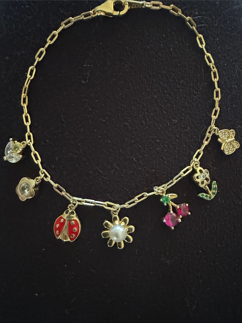 Gold Tone Floral & Charm Bracelet with Red Ladybug and Pink Gem Accents